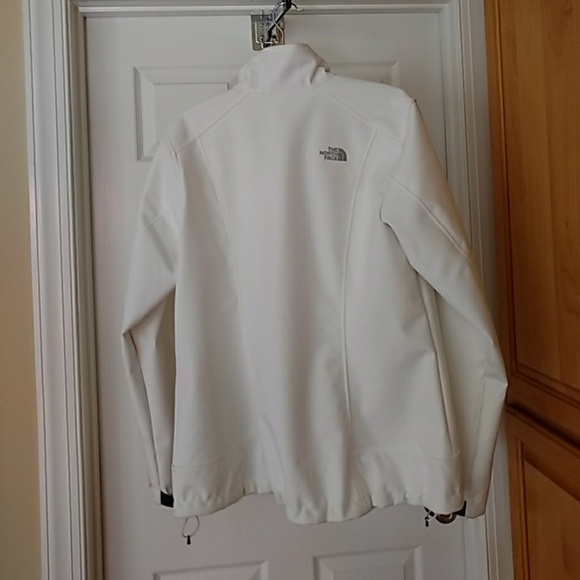 White north face jacket with grey trim at collar. - Picture 3 of 3